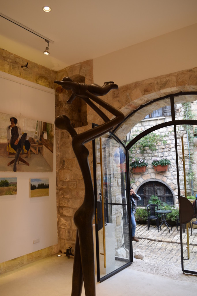 Family-centered sculptures dominate this art shop in Safed's artist colony.